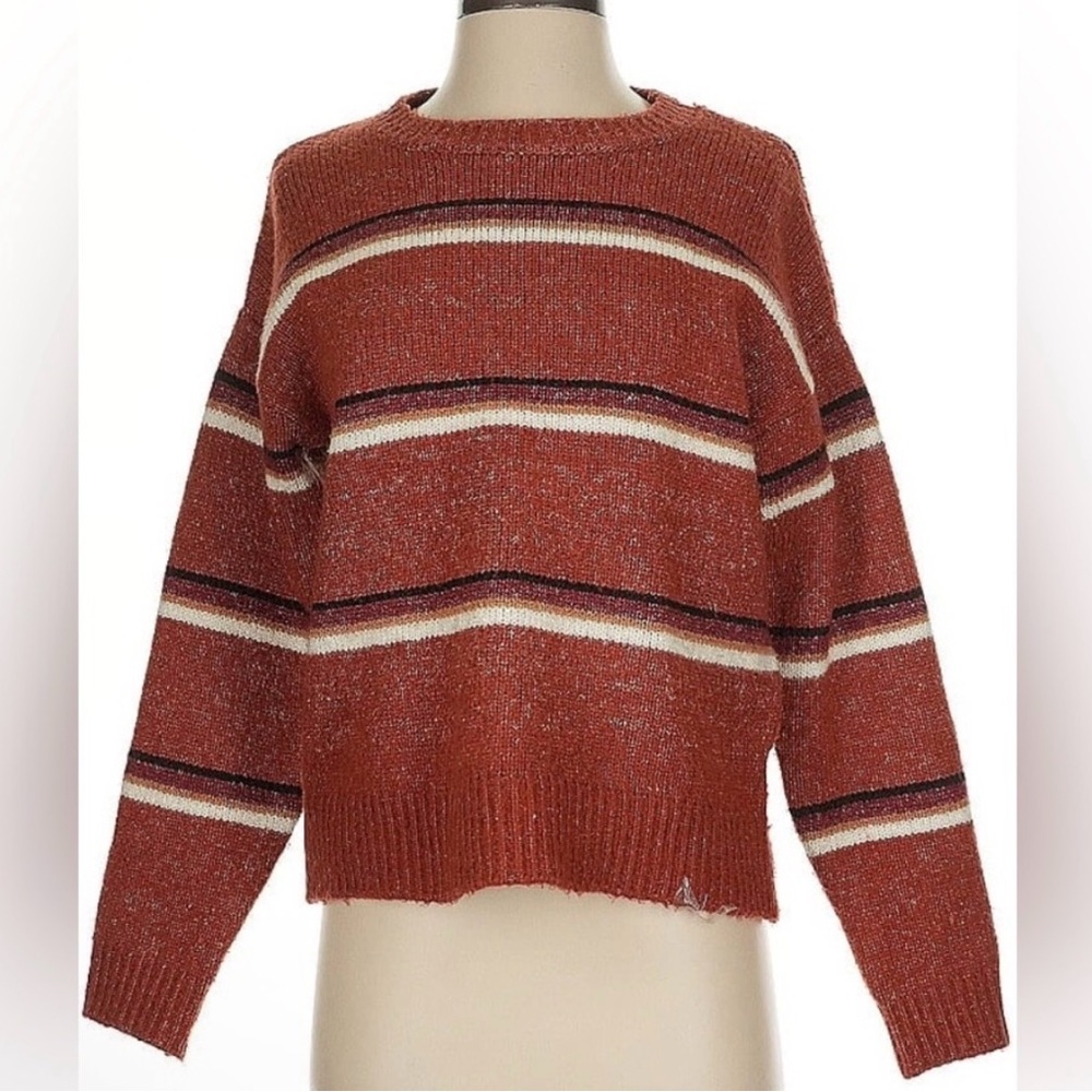Others follow large Striped Rust coloured Sweater